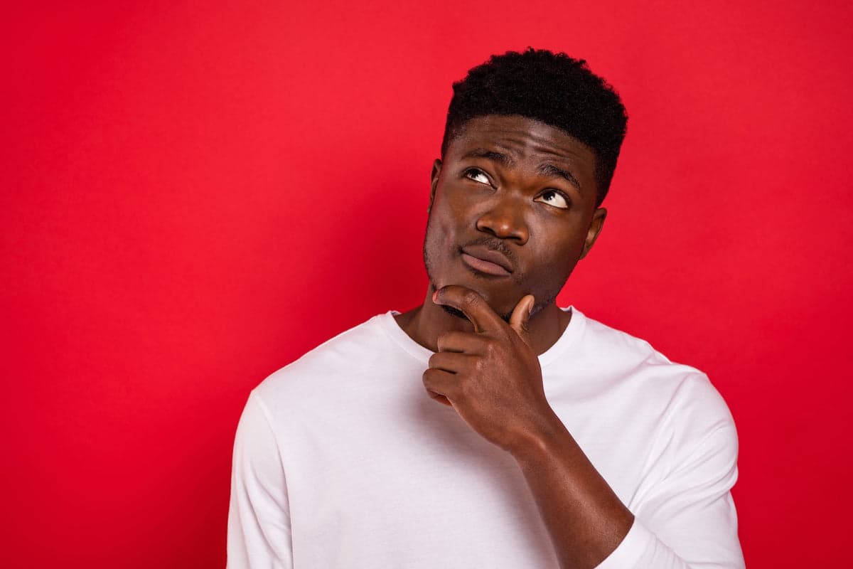 Headshot on a red studio backdrop