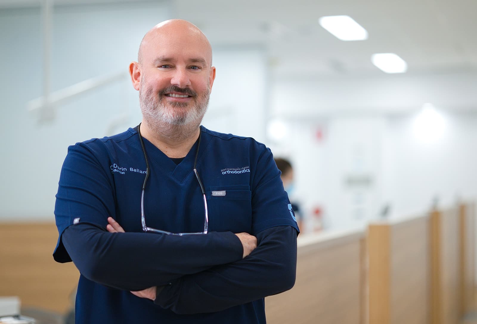 Orthodontist portrait with arms crossed in the clinic